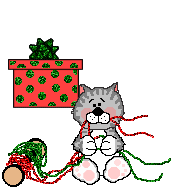 Kitties playing with presents